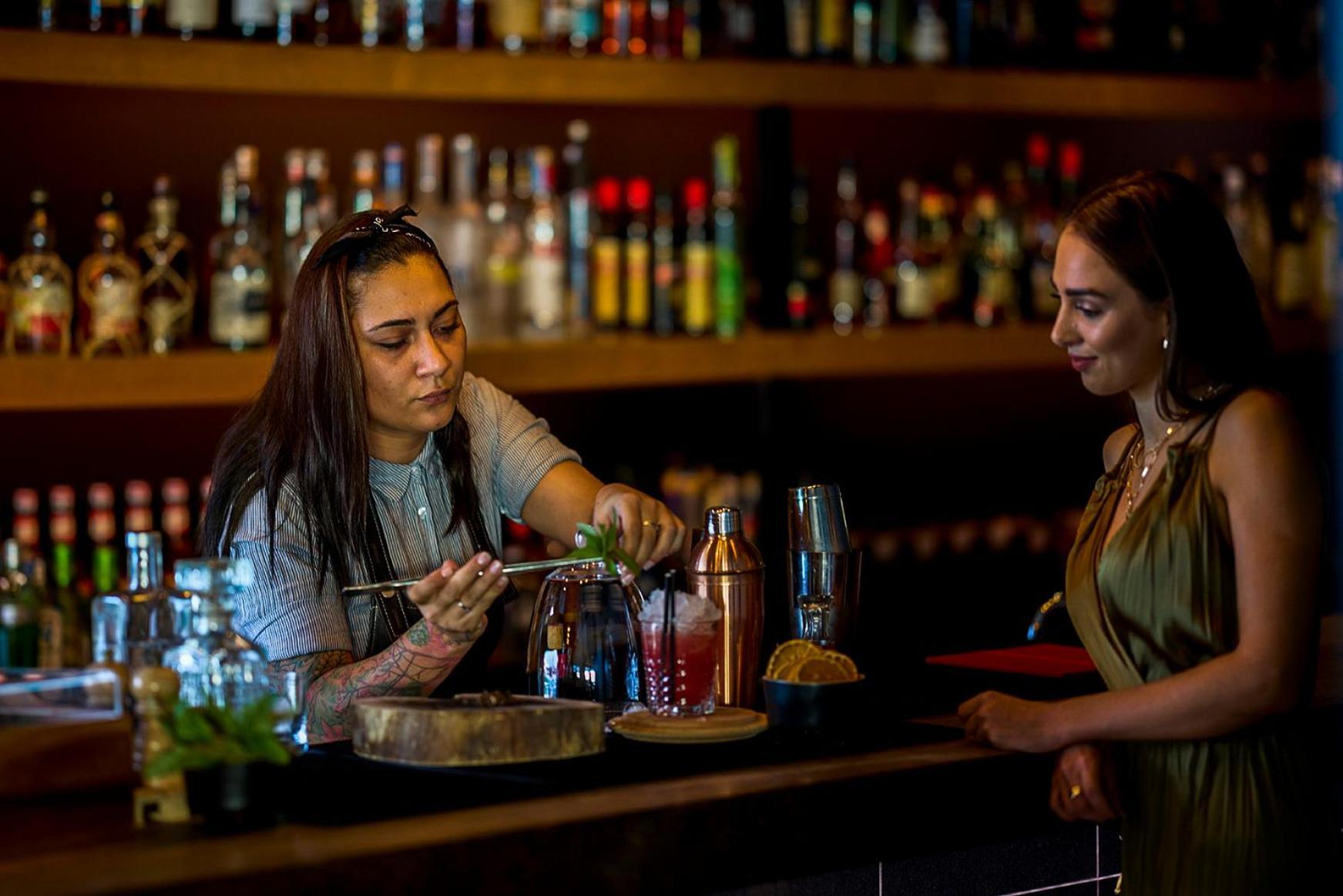 Octant Ponta Delgada Hotel Luaran gambar A bartender at work